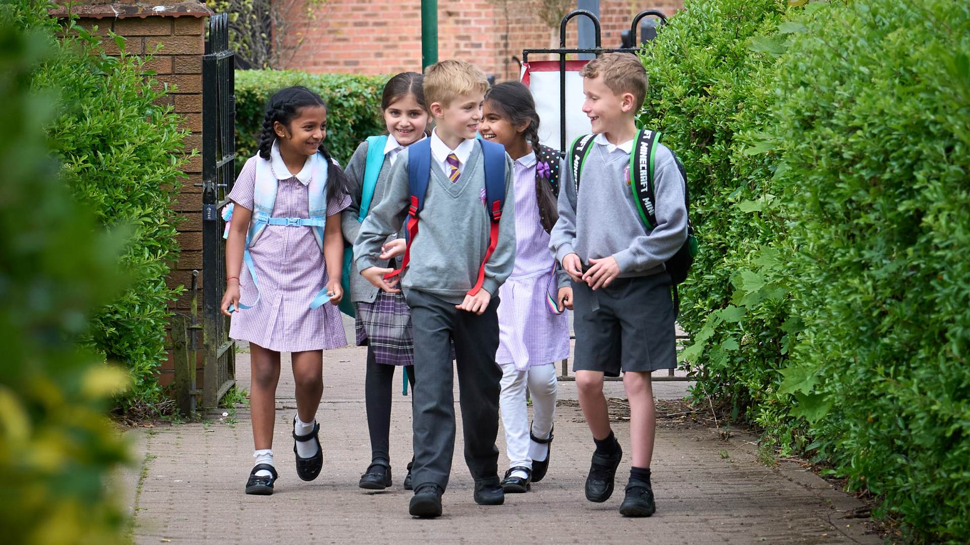 children walking into school